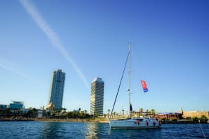 Three yachts in the water during wine tasting, e-bike and sailing experience in Alella