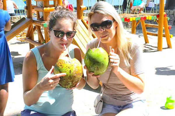 Enjoying a fresh coconut