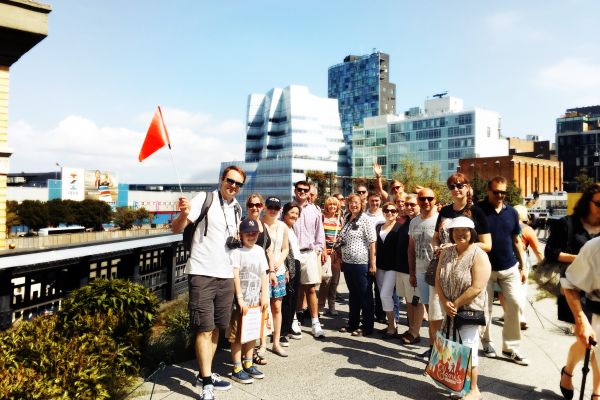 Guide with Group on Inside Broadway Walking Tour