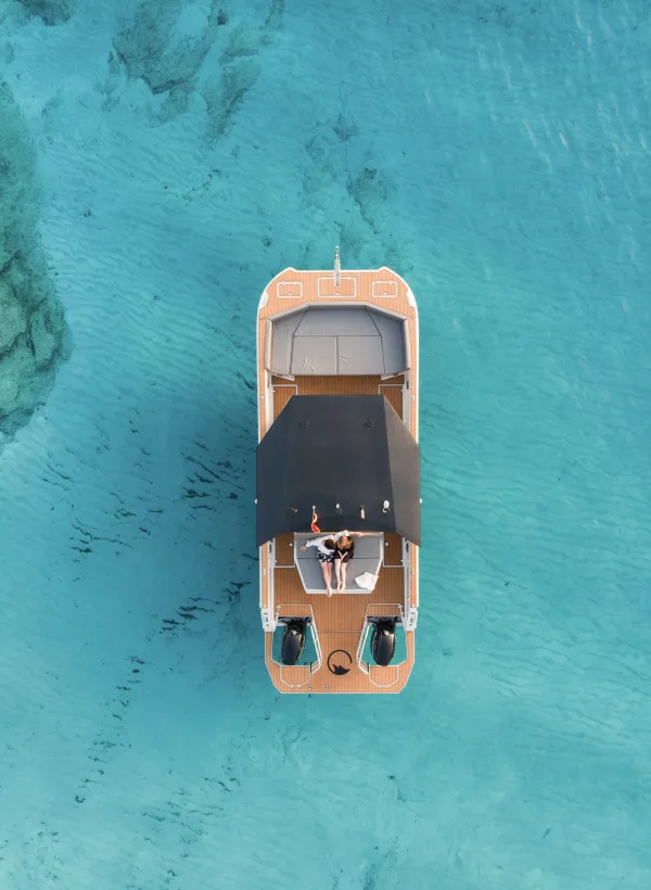 Overhead view of the Mobula catamaran with its sunshade and sundeck