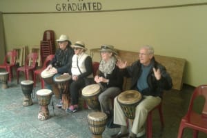 Take part in drumming