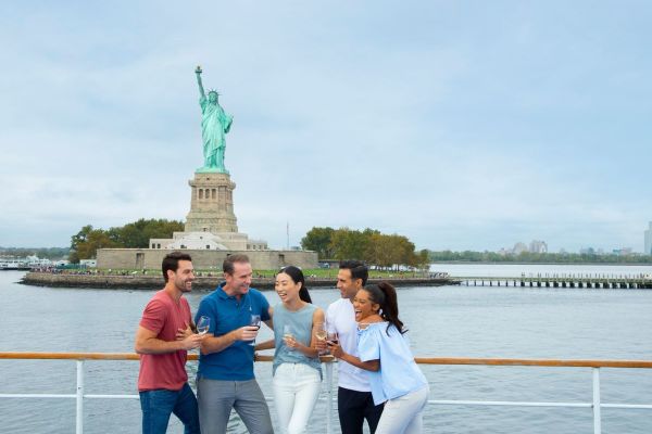 A group wining on the NYC Downtown Sightseeing Cruise