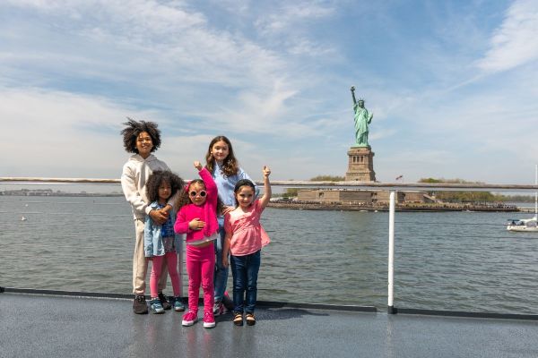A group of Kids on the NYC Downtown Sightseeing Cruise