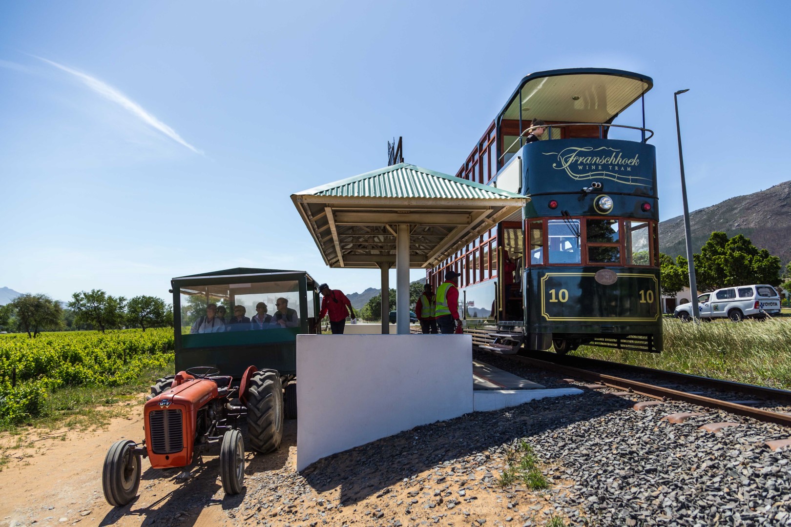 Passengers disembarking the Wine Tram, on route to a wine farm