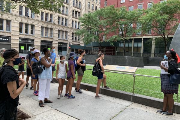 A group being guided on the NYC Slavery Tour