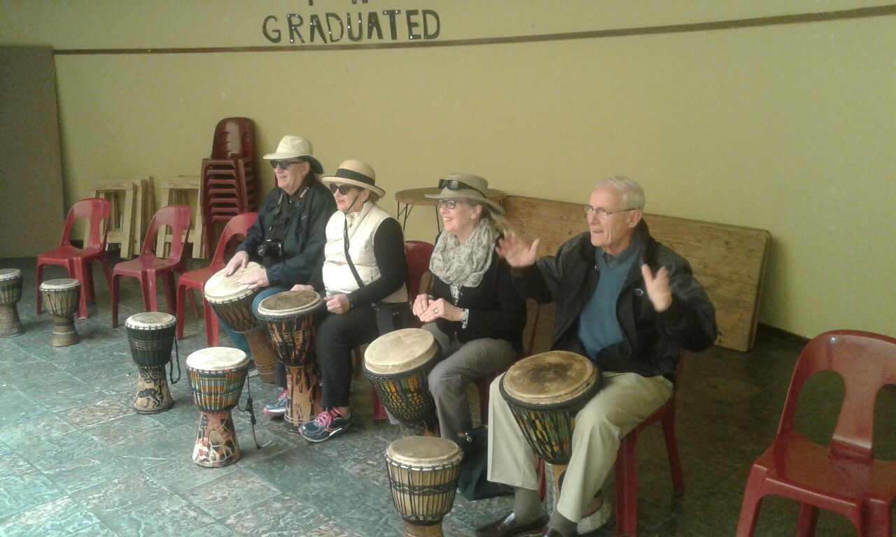 Take part in drumming