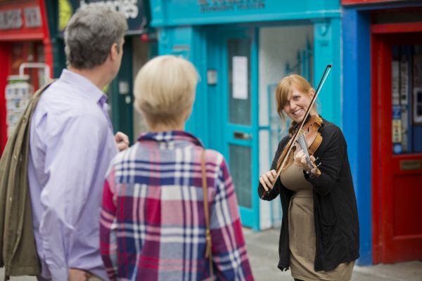 Galway Experience street entertainment from local musicians, singers and performers in this vibrant city!