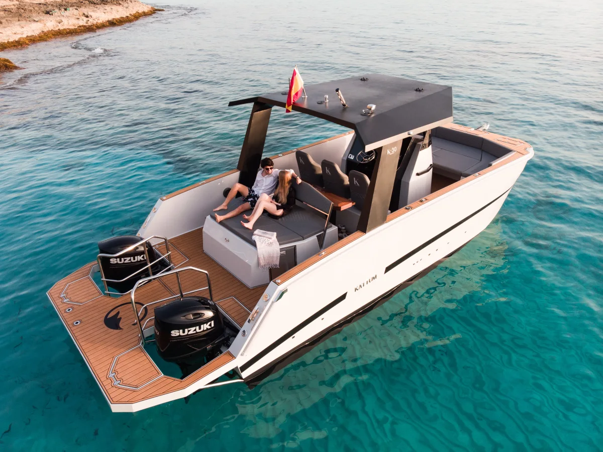 Private catamaran Mobula anchored in turquoise water in the Bay of Palma