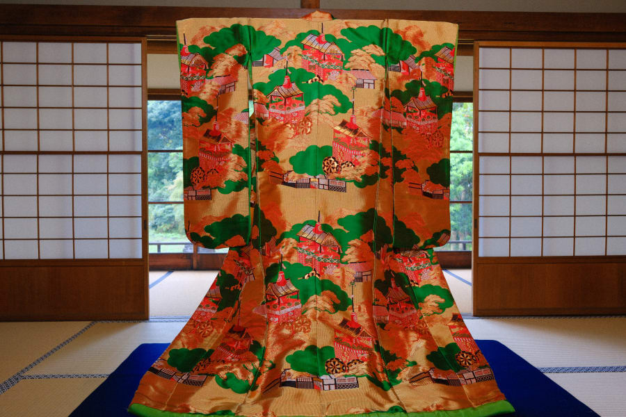 Uchikake with elaborate design with houses and neighborhood during private Uchikake Kimono exhibition.JPG