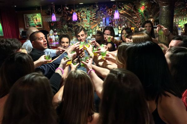 A group having a toast at the Salsa Party
