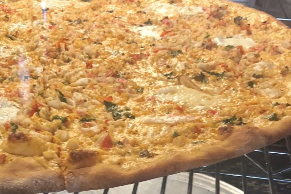 A pizza stop on the Food On Food Midtown Mix Guided Tour