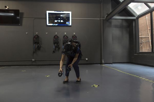 A lady crouching in the Escape VR Game