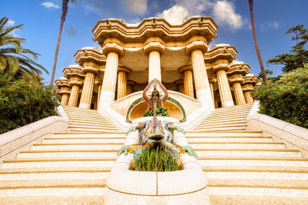 Grand staircase with mosaic decorations and El Drac sculpture at Park Güell.