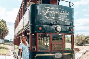 A happy passenger about to board the Franschhoek Wine Tram