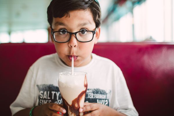 A Boy having a Milkshake at the Kissimmee Theme Park