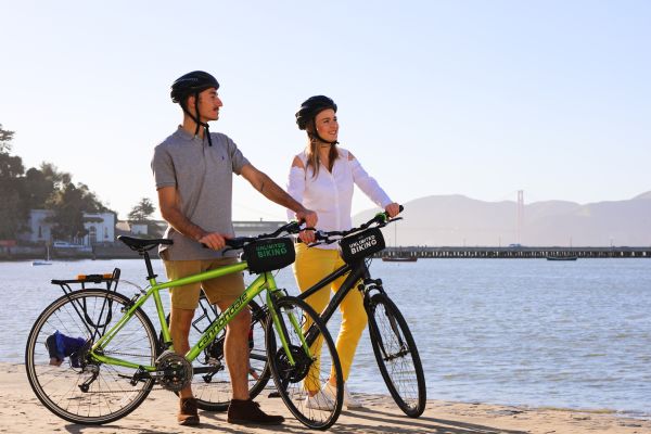 A couple at the beach on the San Diego All-Day Bike Rental