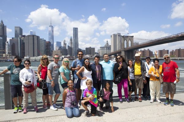 A group on the Brooklyn Bridge and DUMBO Neighborhood Tour
